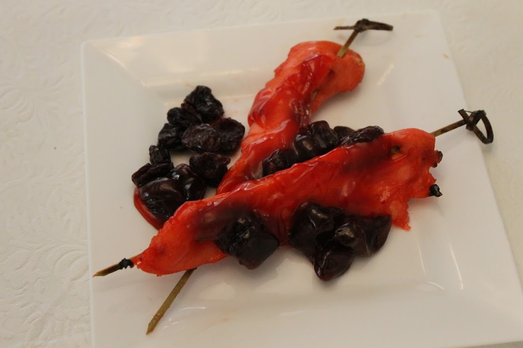 Pomegranate and dried cherry glazed chicken skewers