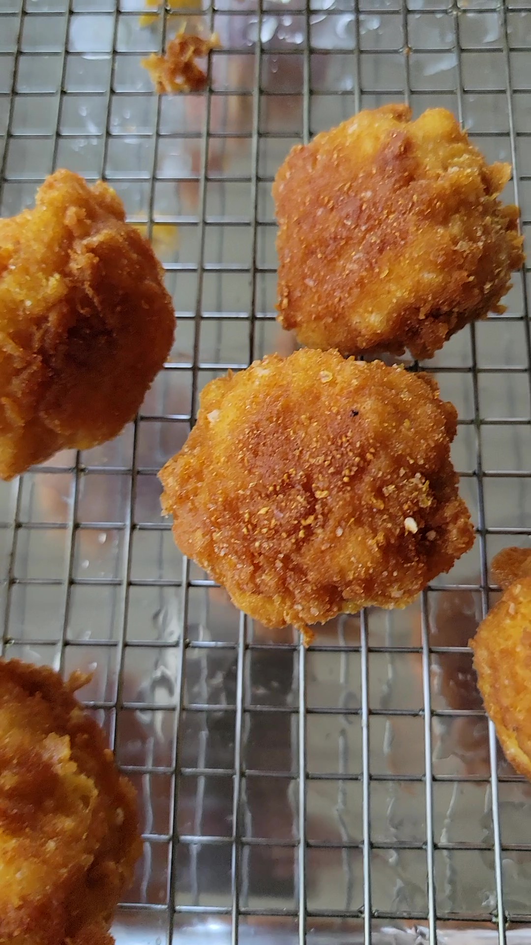 The finished Fried Mac and Cheese Balls set out to cool.