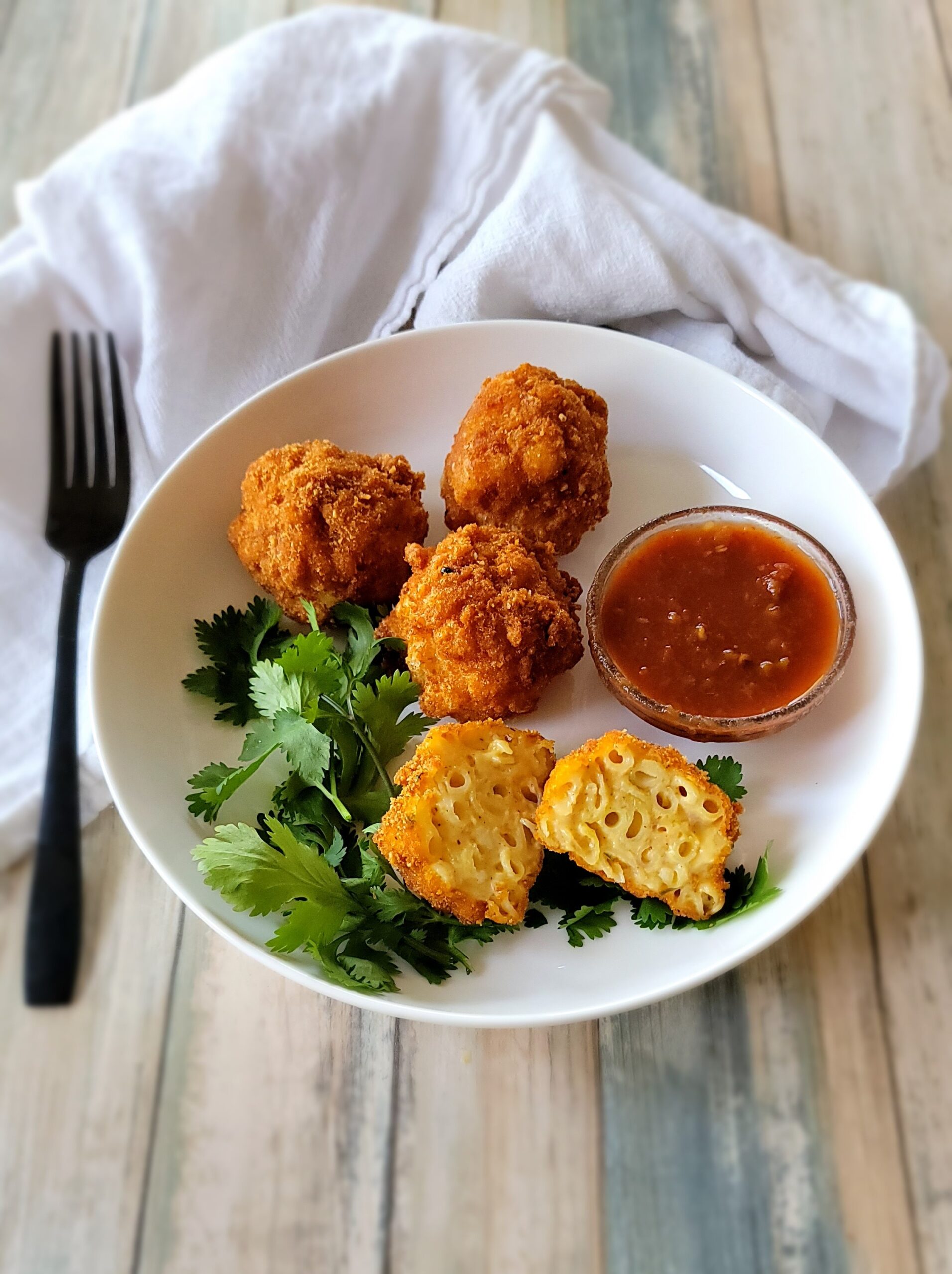 A plate of Fried Mac and Cheese Balls
