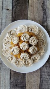 Brown Sugar Meringue with Apple Filling and Rosettes on top.