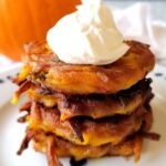 Pumpkin Hash Brown Potato Latkes with Plant Based Sour Cream.