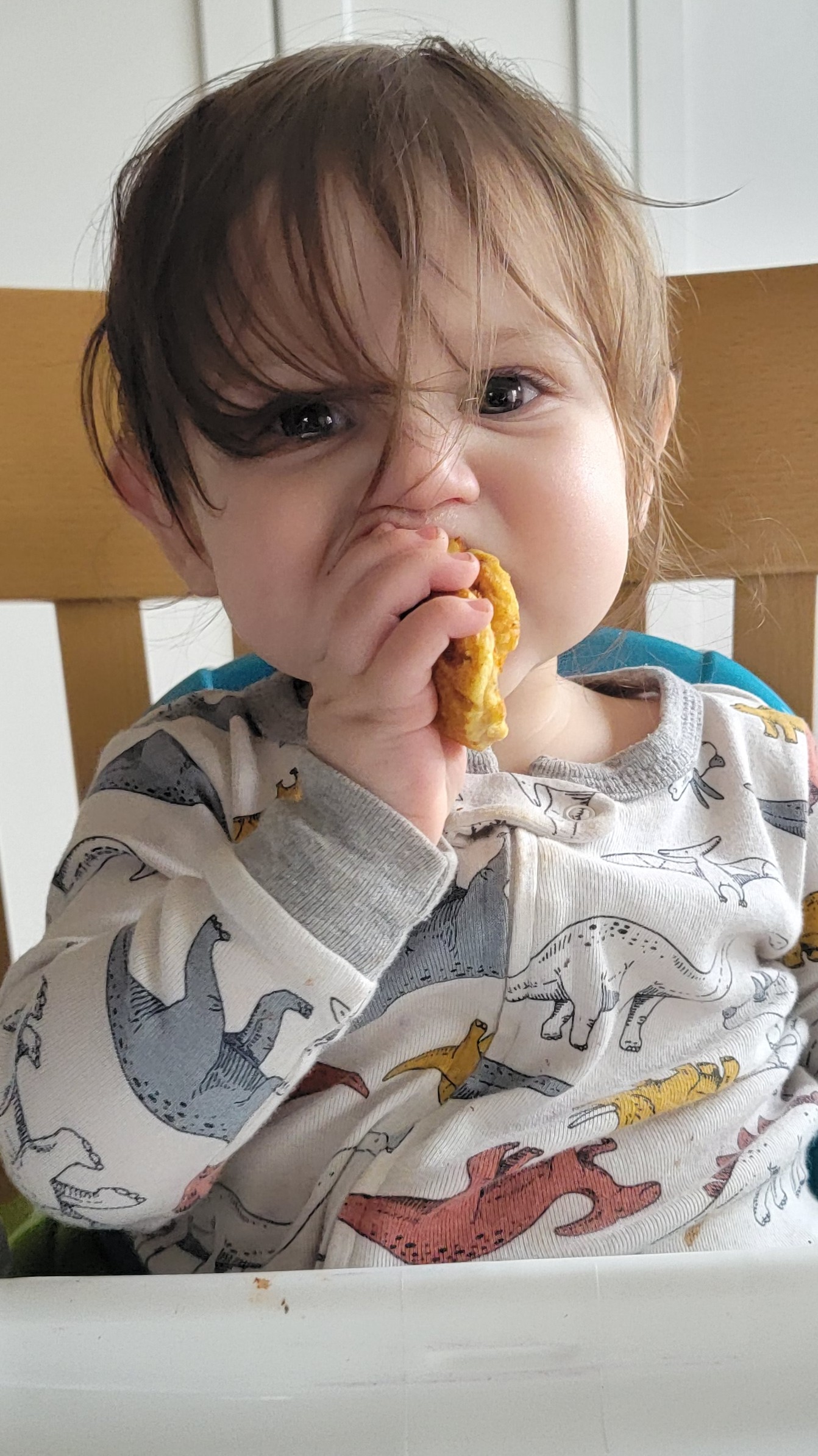 Grandson eating Chocolate Chip Pamcakes