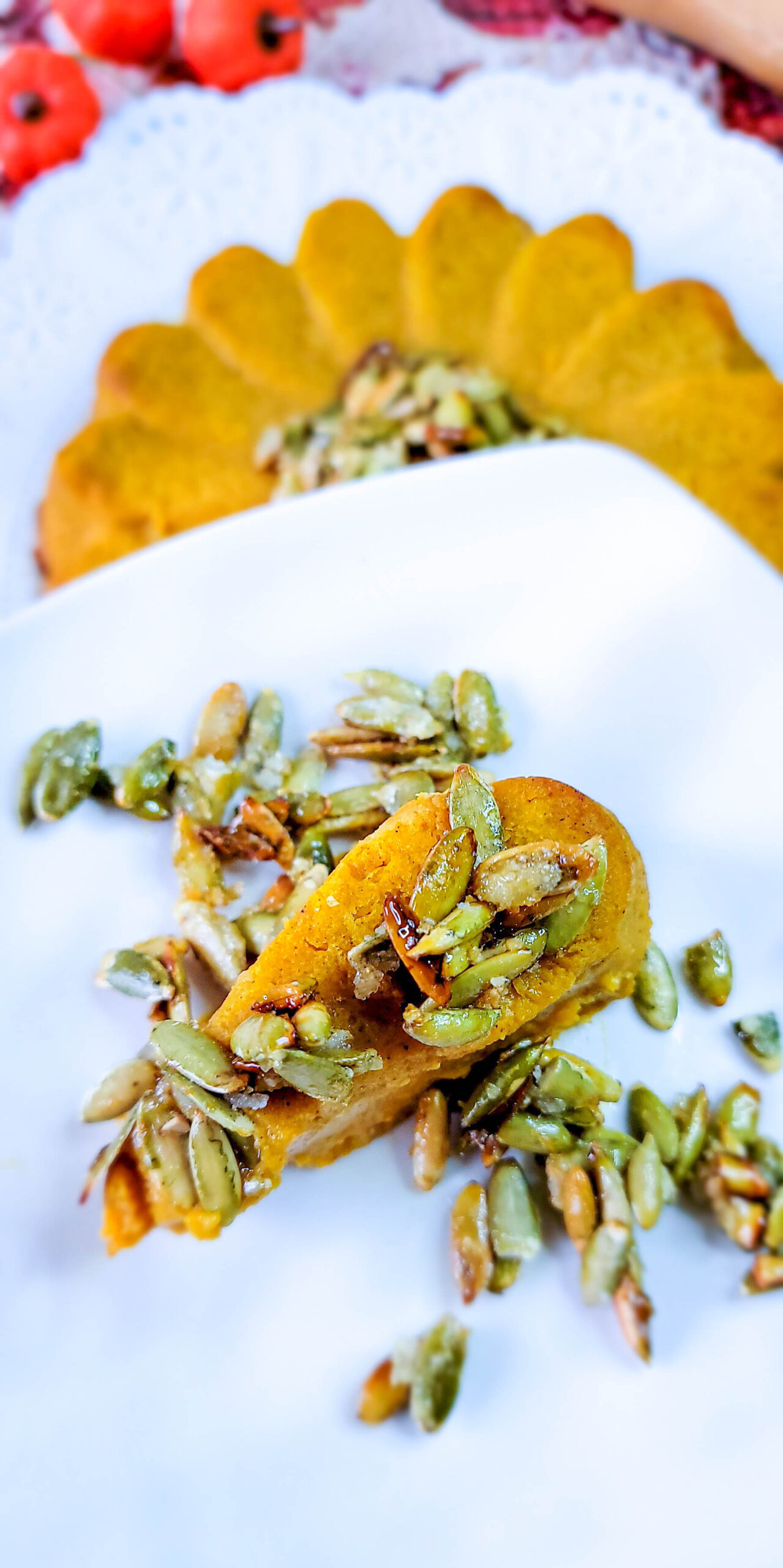 Pumpkin Spice Squash Kugel with Candied Pumpkin Seed Topping