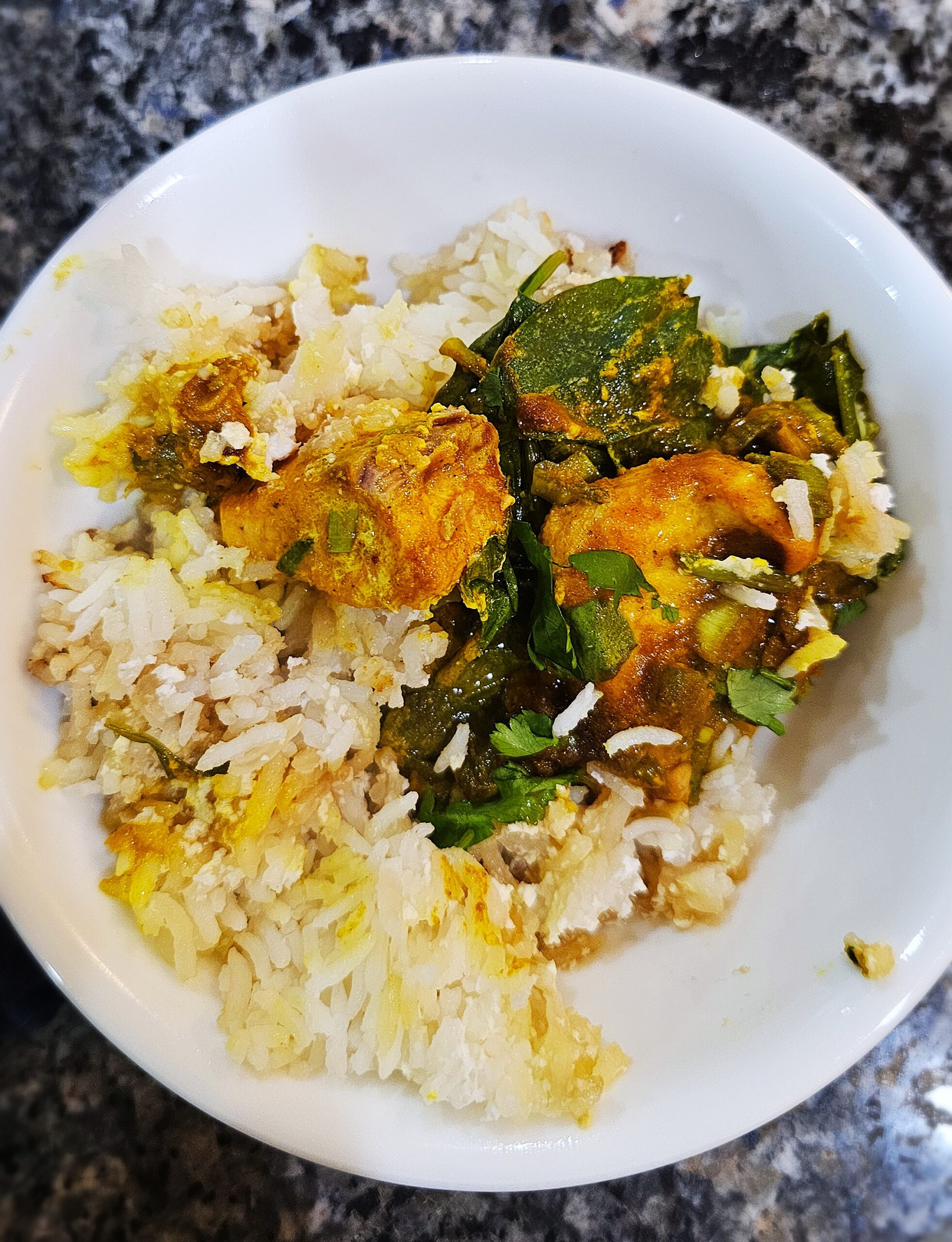 A bowl of One-Pot Miso-Turmeric Salmon and Coconut Rice